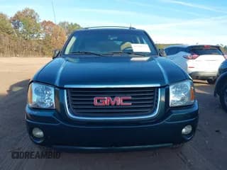 ✅ 2005 GMC Envoy SLT • VIN: 1GKDS13S452164592 • Lot: 43750733. Wystawiony na IAAI z przebiegiem 201 919 mil. Bezpłatny archiwum sprzedaży aukcyjnych z USA i szczegółowy raport historii pojazdu na DreamBid. Zdjęcie 6.
