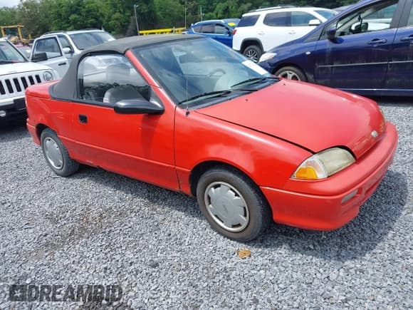 ✅ 1993 Geo Metro • VIN: JG1MR3362PK208056 • Lot: 42721423. Listed on IAAI with 83,021 mi. Free auction sales archive from the USA and detailed vehicle history report at DreamBid. Image 1.