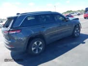 ✅ 2022 Jeep Grand Cherokee • VIN: 1C4RJYB65N8721475 • Lot: 43342814. Listed on IAAI with 81,606 mi. Free auction sales archive from the USA and detailed vehicle history report at DreamBid. Image 4.