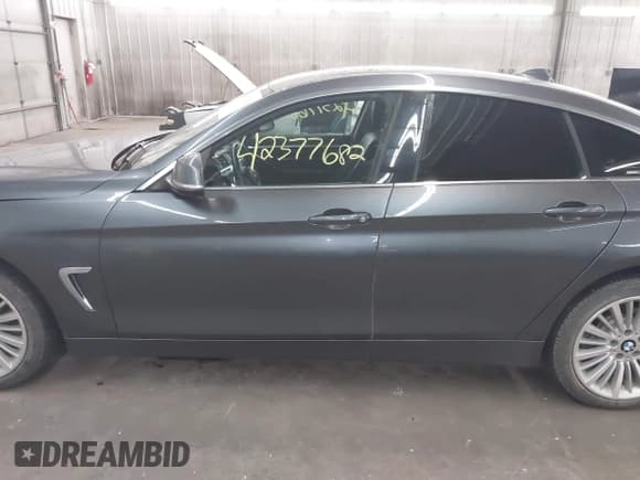 ✅ 2015 BMW 4 Series 428i xDrive • VIN: WBA4A7C52FD414734 • Lot: 42377682. Listed on IAAI with 129,264 mi. Free auction sales archive from the USA and detailed vehicle history report at DreamBid. Image 14.