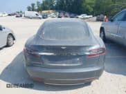 ✅ 2013 Tesla Model S Performance • VIN: 5YJSA1DPXDFP06497 • Lot: 43005300. Listed on IAAI with 33,940 mi. Free auction sales archive from the USA and detailed vehicle history report at DreamBid. Image 16.