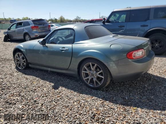 ✅ 2013 Mazda MX-5 Miata Grand Touring • VIN: JM1NC2PFXD0228256 • Lot: 48791765. Listed on Copart with 146,193 mi. Free auction sales archive from the USA and detailed vehicle history report at DreamBid. Image 2.