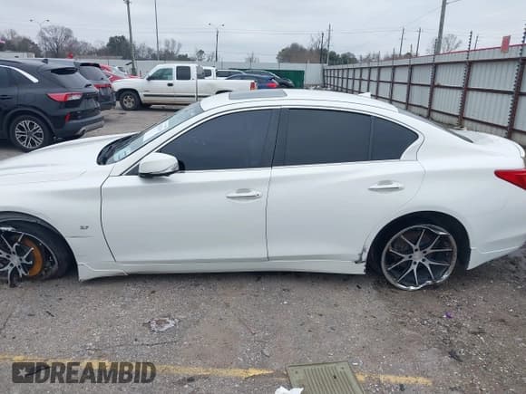 ✅ 2014 Infiniti Q50 Sport • VIN: JN1BV7AP1EM688494 • Lot: 41622119. Listed on IAAI with 152,881 mi. Free auction sales archive from the USA and detailed vehicle history report at DreamBid. Image 14.