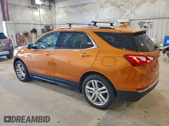 ✅ 2018 Chevrolet Equinox Premier • VIN: 2GNAXWEX9J6199199 • Lot: 93879475. Wystawiony na Copart z przebiegiem 87 660 mil. Bezpłatny archiwum sprzedaży aukcyjnych z USA i szczegółowy raport historii pojazdu na DreamBid. Zdjęcie 2.