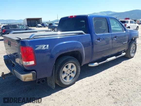✅ 2013 GMC Sierra 1500 SLT • VIN: 3GTP2WE76DG375975 • Lot: 42374696. Listed on IAAI with 201,057 mi. Free auction sales archive from the USA and detailed vehicle history report at DreamBid. Image 4.