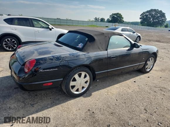 ✅ 2003 Ford Thunderbird Deluxe • VIN: 1FAHP60A03Y104817 • Lot: 63783485. Wystawiony na Copart z przebiegiem 106 673 mil. Bezpłatny archiwum sprzedaży aukcyjnych z USA i szczegółowy raport historii pojazdu na DreamBid. Zdjęcie 3.