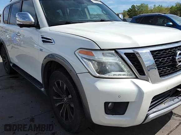 ✅ 2017 Nissan Armada Platinum • VIN: JN8AY2NE5H9702520 • Lot: 71742585. Wystawiony na Copart z przebiegiem 143 662 mil. Bezpłatny archiwum sprzedaży aukcyjnych z USA i szczegółowy raport historii pojazdu na DreamBid. Zdjęcie 14.