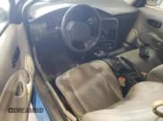 ✅ 2001 Saturn SC • VIN: 1G8ZP12861Z106908 • Лот: 69387405. Опубликован ранее на Copart с пробегом Не указан. Бесплатный доступ к архиву аукционных продаж из США и подробный отчёт об истории автомобиля на DreamBid. Изображение 8.