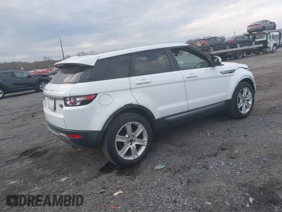 ✅ 2013 Land Rover Range Rover Evoque Pure Premium • VIN: SALVR2BG5DH847016 • Лот: 41653807. Опубликован ранее на IAAI с пробегом 168 007 миль. Бесплатный доступ к архиву аукционных продаж из США и подробный отчёт об истории автомобиля на DreamBid. Изображение 4.