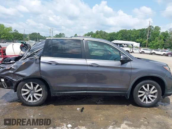 ✅ 2019 Honda Pilot EX-L • VIN: 5FNYF5H4XKB018306 • Lot: 42441441. Wystawiony na IAAI z przebiegiem 53 212 mil. Bezpłatny archiwum sprzedaży aukcyjnych z USA i szczegółowy raport historii pojazdu na DreamBid. Zdjęcie 14.