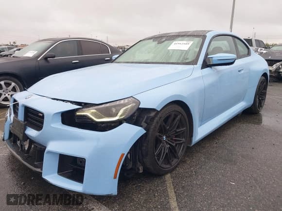 ✅ 2023 BMW M2 • VIN: 3MF13DM09P8D45313 • Lot: 41912105. Listed on IAAI with 27,757 mi. Free auction sales archive from the USA and detailed vehicle history report at DreamBid. Image 2.