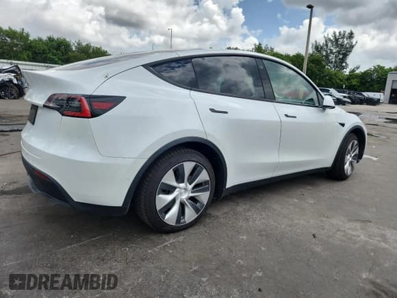 ✅ 2021 Tesla Model Y Standard Range • VIN: 5YJYGDED2MF130273 • Lot: 67707145. Listed on Copart with 65,040 mi. Free auction sales archive from the USA and detailed vehicle history report at DreamBid. Image 3.