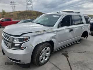 2017 Chevrolet Tahoe Premier with VIN 1GNSKCKC8HR310276, listed as a Copart auction lot 82426675 with 125,835 mi miles and Salvage title. Bid and sale history available at DreamBid. Image 1.