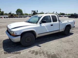 ✅ 2003 Dodge Dakota SLT • VIN: 1D7HL42XX3S236052 • Lot: 61485585. Wystawiony na Copart z przebiegiem 424 339 mil. Bezpłatny archiwum sprzedaży aukcyjnych z USA i szczegółowy raport historii pojazdu na DreamBid. Zdjęcie 1.