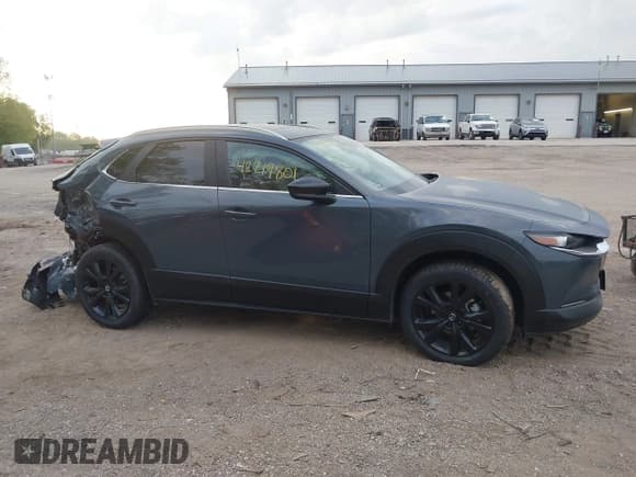 ✅ 2023 Mazda CX-30 S Carbon Edition • VIN: 3MVDMBCM4PM577619 • Lot: 42219801. Listed on IAAI with 24,784 mi. Free auction sales archive from the USA and detailed vehicle history report at DreamBid. Image 13.