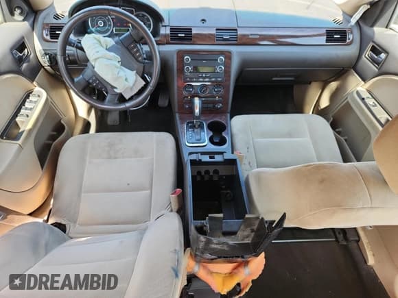 ✅ 2009 Ford Taurus SE • VIN: 1FAHP23W39G104762 • Lot: 64445715. Wystawiony na Copart z przebiegiem 254 561 mil. Bezpłatny archiwum sprzedaży aukcyjnych z USA i szczegółowy raport historii pojazdu na DreamBid. Zdjęcie 8.