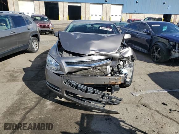 ✅ 2012 Chevrolet Malibu 1LT • VIN: 1G1ZC5E05CF225786 • Lot: 82689925. Listed on Copart with 124,176 mi. Free auction sales archive from the USA and detailed vehicle history report at DreamBid. Image 5.