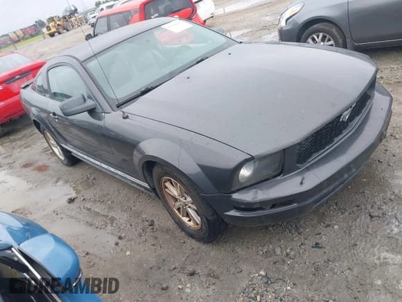 ✅ 2007 Ford Mustang Deluxe • VIN: 1ZVFT80NX75211227 • Lot: 42412832. Listed on IAAI with 166,297 mi. Free auction sales archive from the USA and detailed vehicle history report at DreamBid. Image 1.