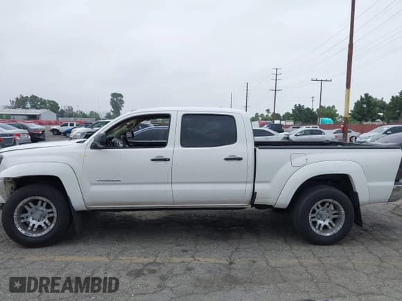 ✅ 2009 Toyota Tacoma PreRunner • VIN: 3TMKU72N49M020938 • Lot: 42422101. Listed on IAAI with 89,335 mi. Free auction sales archive from the USA and detailed vehicle history report at DreamBid. Image 14.