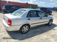 ✅ 2002 Mazda Protege DX • VIN: JM1BJ225320634626 • Lot: 84905245. Wystawiony na Copart z przebiegiem 178 114 mil. Bezpłatny archiwum sprzedaży aukcyjnych z USA i szczegółowy raport historii pojazdu na DreamBid. Zdjęcie 3.