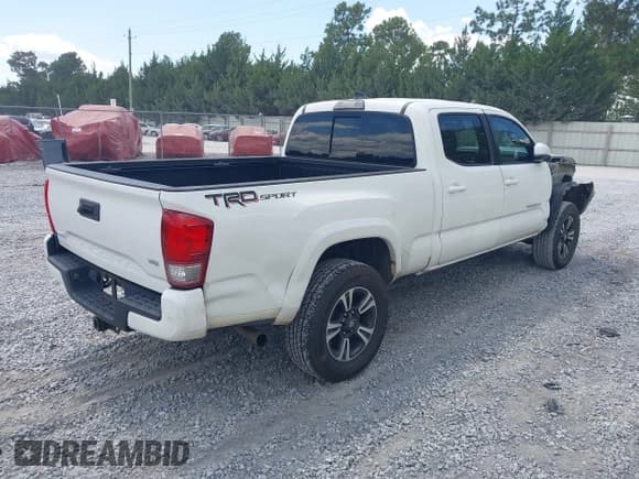 ✅ 2017 Toyota Tacoma SR5 • VIN: 3TMBZ5DNXHM006172 • Lot: 43084480. Listed on IAAI with 141,669 mi. Free auction sales archive from the USA and detailed vehicle history report at DreamBid. Image 4.