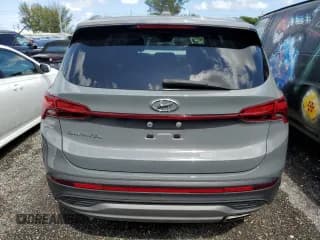 ✅ 2021 Hyundai Santa Fe SE • VIN: 5NMS14AJ5MH338424 • Lot: 49320503. Wystawiony na Copart z przebiegiem 21 930 mil. Bezpłatny archiwum sprzedaży aukcyjnych z USA i szczegółowy raport historii pojazdu na DreamBid. Zdjęcie 6.