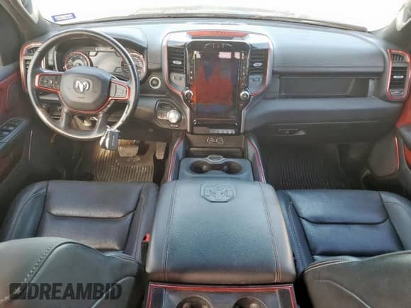 2020 Ram 1500 Rebel z VIN 1C6SRFLM1LN231228, wystawiony jako Copart lot #58342265 z przebiegiem 133 097 mil mil oraz Czysty tytuł • Clean title. Historia ofert i sprzedaży dostępna na DreamBid. Obrazek 8.