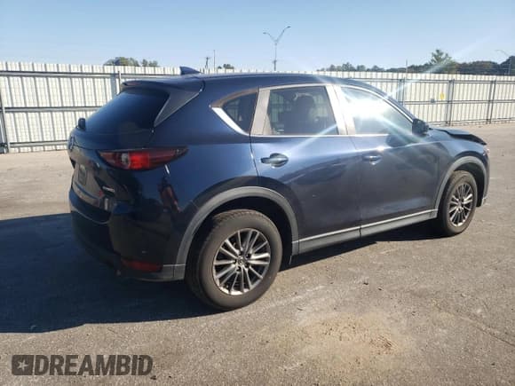 ✅ 2021 Mazda CX-5 Touring • VIN: JM3KFACM5M1354857 • Lot: 89668295. Wystawiony na Copart z przebiegiem 55 797 mil. Bezpłatny archiwum sprzedaży aukcyjnych z USA i szczegółowy raport historii pojazdu na DreamBid. Zdjęcie 3.