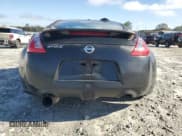 ✅ 2009 Nissan 370Z • VIN: JN1AZ44EX9M404083 • Lot: 91008375. Listed on Copart with 185,773 mi. Free auction sales archive from the USA and detailed vehicle history report at DreamBid. Image 6.