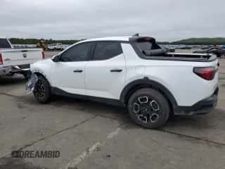 2022 Hyundai Santa Cruz SEL z VIN 5NTJBDAE9NH009503, wystawiony jako Copart lot #64002324 z przebiegiem 60 043 mil mil oraz Szkoda całkowita • Salvage title. Historia ofert i sprzedaży dostępna na DreamBid. Obrazek 2.