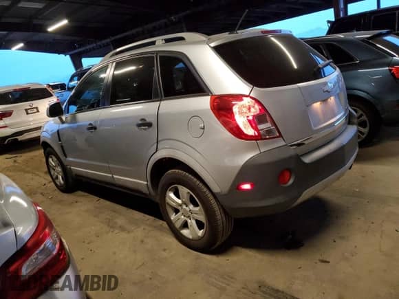 2013 Chevrolet Captiva Sport LS with VIN 3GNAL2EK0DS586867, listed as a Copart auction lot 84714444 with 80,469 mi miles and Salvage title. Bid and sale history available at DreamBid. Image 2.