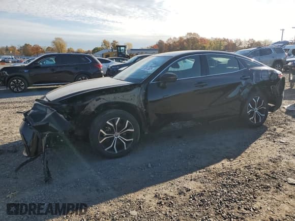 ✅ 2023 Toyota Crown XLE • VIN: JTDAAAAF7P3000290 • Лот: 90613825. Опубликован ранее на Copart с пробегом 102 922 миль. Бесплатный доступ к архиву аукционных продаж из США и подробный отчёт об истории автомобиля на DreamBid. Изображение 1.