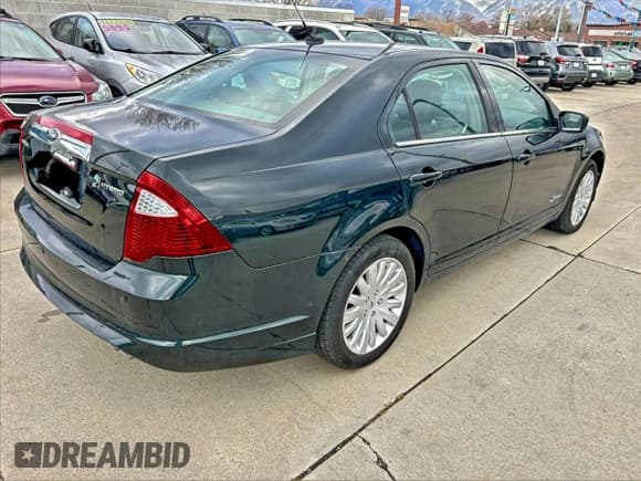 ✅ 2010 Ford Fusion Hybrid • VIN: 3FADP0L36AR423269 • Lot: 95870955. Wystawiony na Copart z przebiegiem 48 855 mil. Bezpłatny archiwum sprzedaży aukcyjnych z USA i szczegółowy raport historii pojazdu na DreamBid. Zdjęcie 4.