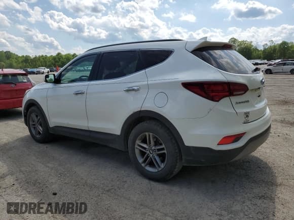 ✅ 2017 Hyundai Santa Fe 2.4L • VIN: 5XYZUDLB7HG388382 • Lot: 57167315. Listed on Copart with 128,724 mi. Free auction sales archive from the USA and detailed vehicle history report at DreamBid. Image 2.