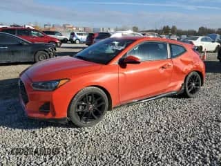 2020 Hyundai Veloster Turbo Ultimate z VIN KMHTH6AB0LU024445, wystawiony jako Copart lot #79214764 z przebiegiem 145 860 mil mil oraz Szkoda całkowita • Salvage title. Historia ofert i sprzedaży dostępna na DreamBid. Obrazek 1.