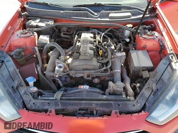 2013 Hyundai Genesis Coupe 2.0T z VIN KMHHT6KD0DU096400, wystawiony jako Copart lot #82832654 z przebiegiem 98 701 mil mil oraz Szkoda całkowita • Salvage title. Historia ofert i sprzedaży dostępna na DreamBid. Obrazek 11.