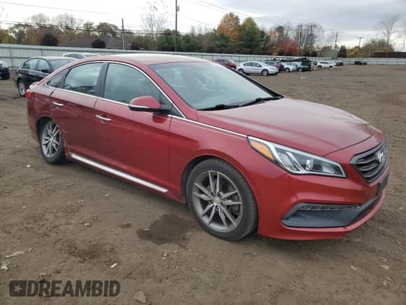2015 Hyundai Sonata Sport with VIN 5NPE34AB2FH076769, listed as a Copart auction lot 90493865 with 106,627 mi miles and Salvage title. Bid and sale history available at DreamBid. Image 4.