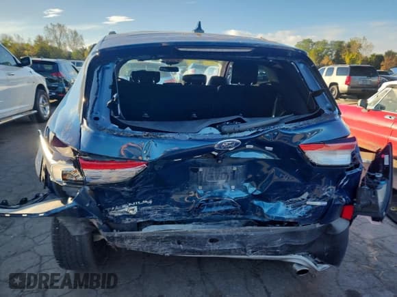 ✅ 2020 Ford Escape Titanium • VIN: 1FMCU9J98LUA20511 • Lot: 86096125. Listed on Copart with 54,496 mi. Free auction sales archive from the USA and detailed vehicle history report at DreamBid. Image 6.