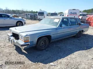 ✅ 1988 Cadillac Brougham • VIN: 1G6DW51Y1J9711403 • Лот: 41630262. Опубликован ранее на IAAI с пробегом 51 635 миль. Бесплатный доступ к архиву аукционных продаж из США и подробный отчёт об истории автомобиля на DreamBid. Изображение 2.