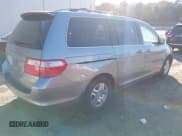✅ 2006 Honda Odyssey EX-L • VIN: 5FNRL387X6B094271 • Лот: 43743098. Опубликован ранее на IAAI с пробегом 215 736 миль. Бесплатный доступ к архиву аукционных продаж из США и подробный отчёт об истории автомобиля на DreamBid. Изображение 4.