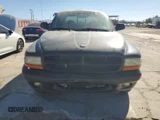 2003 Dodge Dakota Sport z VIN 1D7HL38N03S172331, wystawiony jako Copart lot #78851764 z przebiegiem 162 521 mil mil oraz Czysty tytuł • Clean title. Historia ofert i sprzedaży dostępna na DreamBid. Obrazek 5.