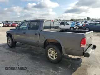 2001 Dodge Dakota Sport z VIN 1B7HG2AN91S333999, wystawiony jako Copart lot #73388754 z przebiegiem 202 759 mil mil oraz Szkoda całkowita • Salvage title. Historia ofert i sprzedaży dostępna na DreamBid. Obrazek 2.