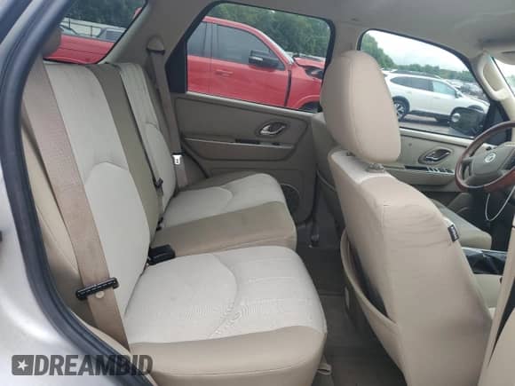 2006 Mercury Mariner Luxury z VIN 4M2CU56196KJ17209, wystawiony jako Copart lot #58450665 z przebiegiem 239 728 mil mil oraz Szkoda całkowita • Salvage title. Historia ofert i sprzedaży dostępna na DreamBid. Obrazek 11.