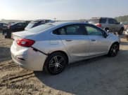 ✅ 2018 Chevrolet Cruze LT • VIN: 1G1BE5SM2J7163760 • Lot: 61924883. Listed on Copart with 62,963 mi. Free auction sales archive from the USA and detailed vehicle history report at DreamBid. Image 3.