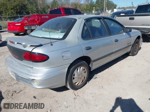 ✅ 2001 Pontiac Sunfire SE • VIN: 1G2JB524217173494 • Lot: 41276548. Wystawiony na IAAI z przebiegiem Nie podano. Bezpłatny archiwum sprzedaży aukcyjnych z USA i szczegółowy raport historii pojazdu na DreamBid. Zdjęcie 4.
