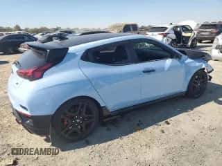 2022 Hyundai Veloster z VIN KMHT36AH2NU015350, wystawiony jako Copart lot #73527124 z przebiegiem 26 345 mil mil oraz Szkoda całkowita • Salvage title. Historia ofert i sprzedaży dostępna na DreamBid. Obrazek 3.