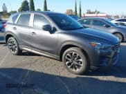 ✅ 2016 Mazda CX-5 Grand Touring • VIN: JM3KE4DY4G0853326 • Lot: 43589595. Wystawiony na IAAI z przebiegiem 69 517 mil. Bezpłatny archiwum sprzedaży aukcyjnych z USA i szczegółowy raport historii pojazdu na DreamBid. Zdjęcie 1.