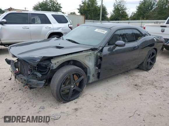 2009 Dodge Challenger R/T z VIN 2B3LJ54T19H500299, wystawiony jako Copart lot #72713494 z przebiegiem 99 954 mil mil oraz Szkoda całkowita • Salvage title. Historia ofert i sprzedaży dostępna na DreamBid. Obrazek 1.