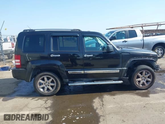✅ 2012 Jeep Liberty Limited • VIN: 1C4PJLCK3CW107183 • Lot: 42428236. Listed on IAAI with 161,961 mi. Free auction sales archive from the USA and detailed vehicle history report at DreamBid. Image 14.