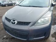 ✅ 2009 Mazda CX-7 Grand Touring • VIN: JM3ER29L090226340 • Lot: 42035530. Wystawiony na IAAI z przebiegiem 189 912 mil. Bezpłatny archiwum sprzedaży aukcyjnych z USA i szczegółowy raport historii pojazdu na DreamBid. Zdjęcie 6.